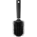 Black round hair brush diversion safe with bristles and removable handle compartment.