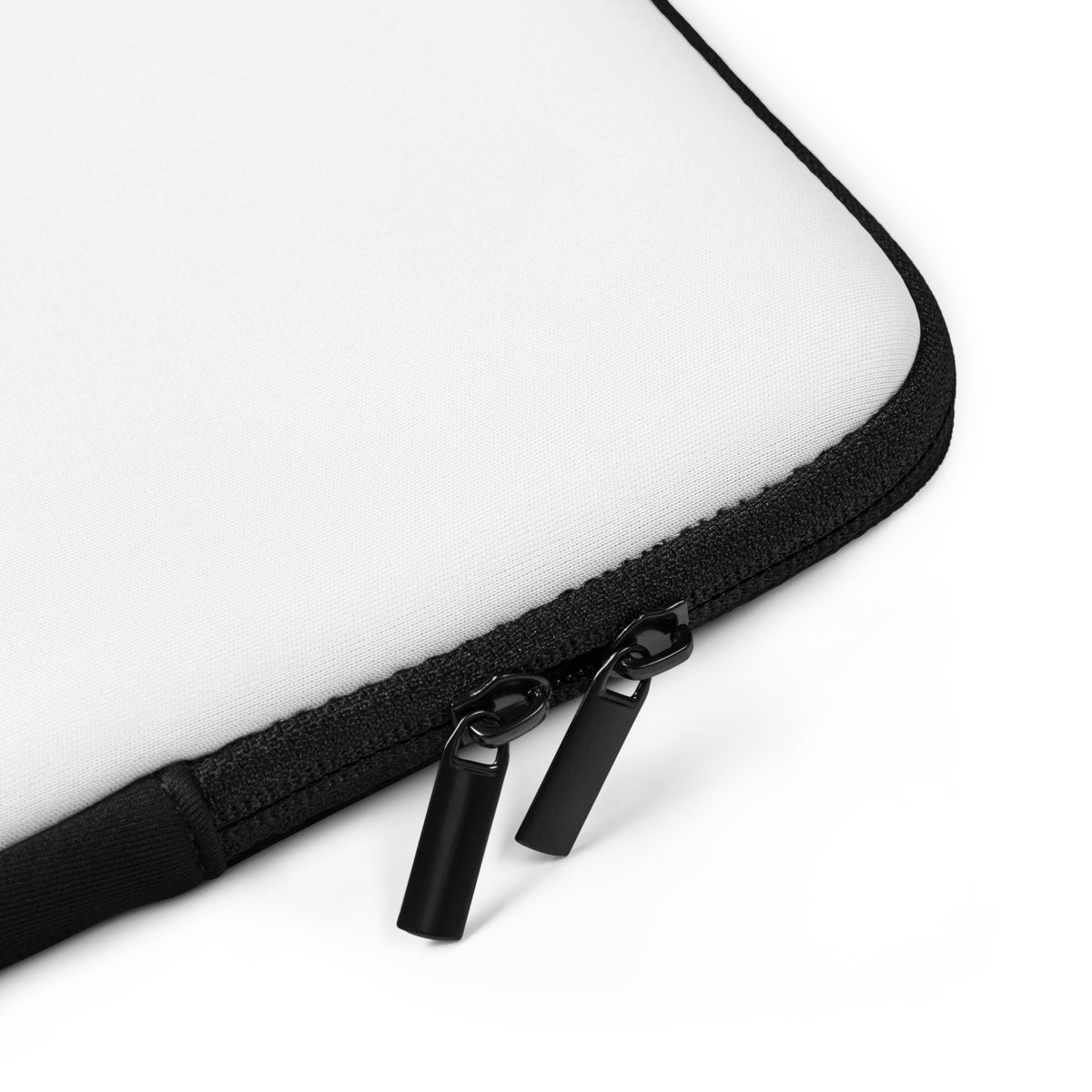Detail of zipper closure on white SECURITY laptop sleeve.